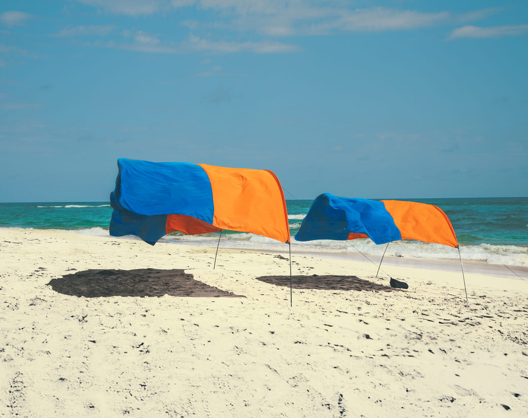 Shibumi wind-assisted sunshade canopy