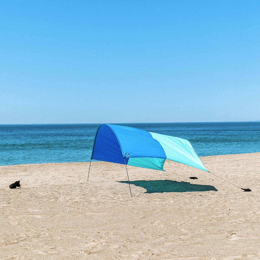 Shibumi wind-assisted sunshade canopy